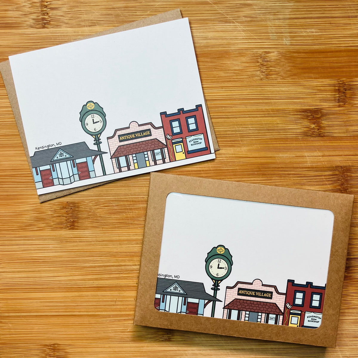 Brown kraft stationery set and notecard featuring an illustration of a Kensington, MD storefronts.